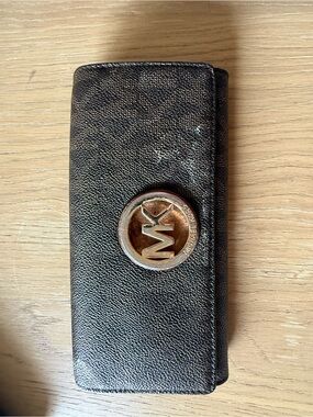 Michael Kors Black and Gold MK Emblem Continental Wallet